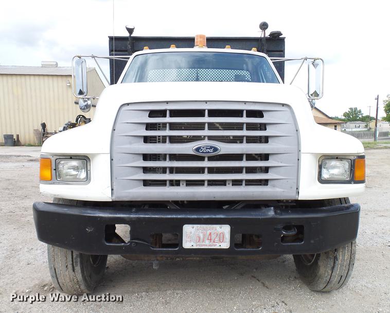 image for item DD8312 1998 Ford F800 flatbed truck with Vermeer MTE37 mud mix system