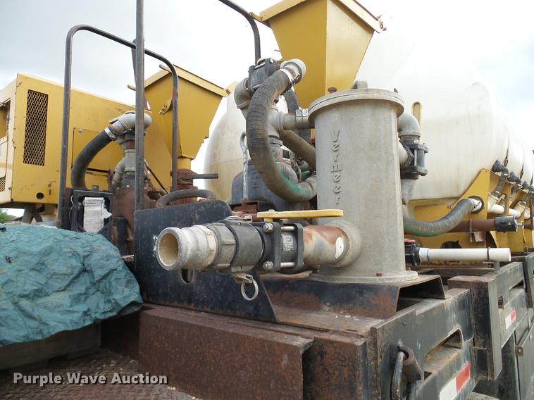 image for item DD8312 1998 Ford F800 flatbed truck with Vermeer MTE37 mud mix system