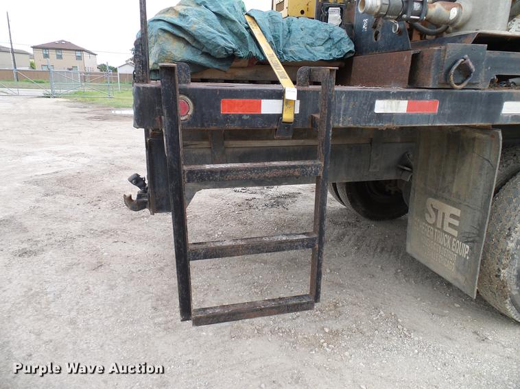 image for item DD8312 1998 Ford F800 flatbed truck with Vermeer MTE37 mud mix system