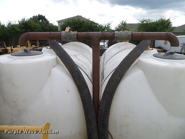 image for item DD8312 1998 Ford F800 flatbed truck with Vermeer MTE37 mud mix system