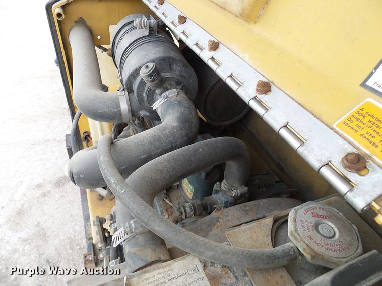 image for item DD8312 1998 Ford F800 flatbed truck with Vermeer MTE37 mud mix system