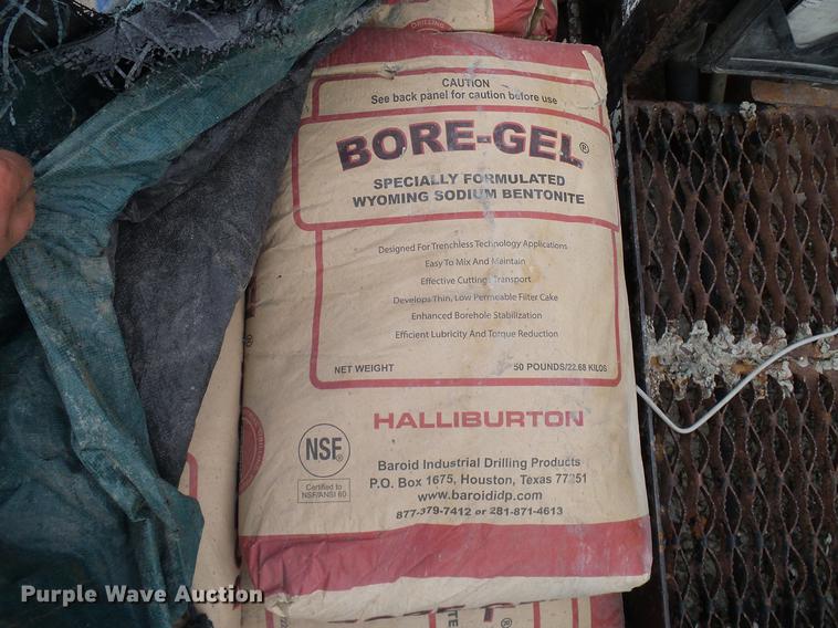 image for item DD8312 1998 Ford F800 flatbed truck with Vermeer MTE37 mud mix system