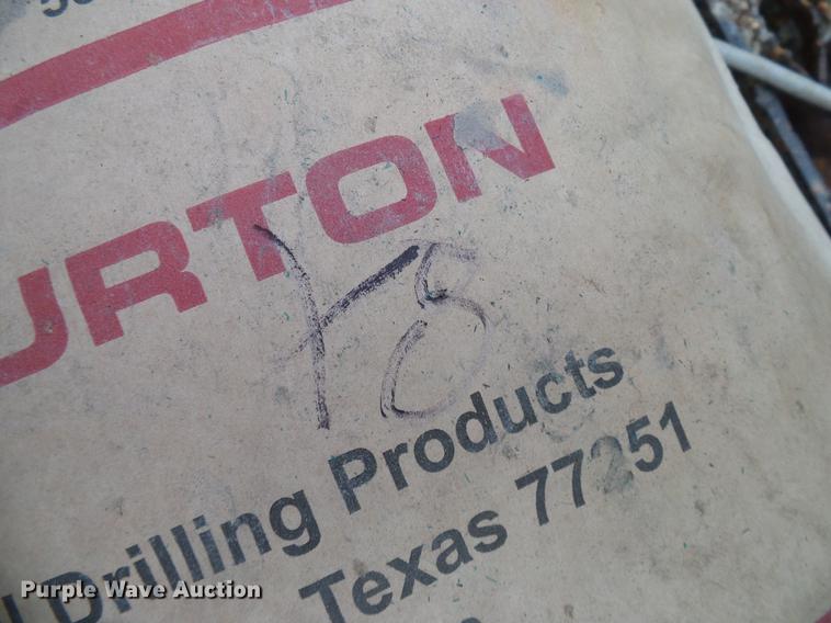 image for item DD8312 1998 Ford F800 flatbed truck with Vermeer MTE37 mud mix system