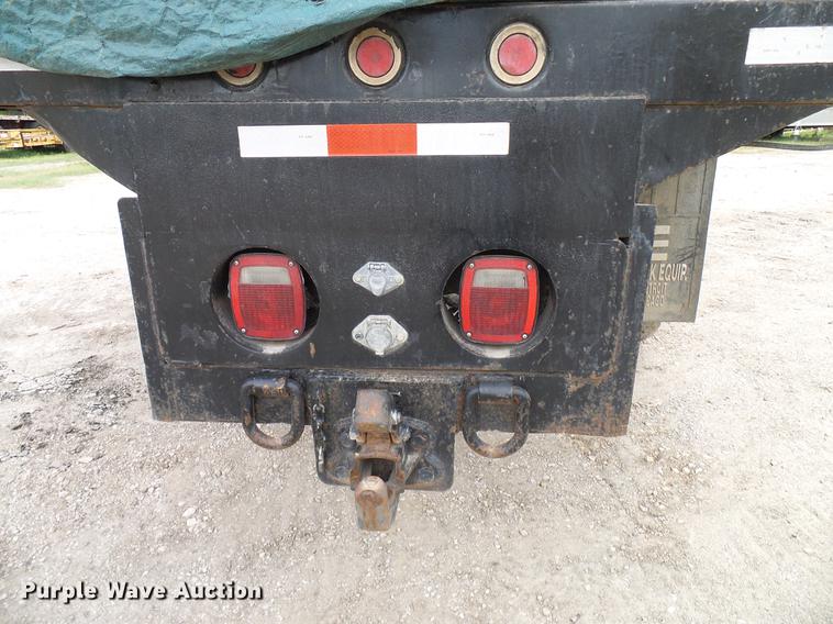 image for item DD8312 1998 Ford F800 flatbed truck with Vermeer MTE37 mud mix system