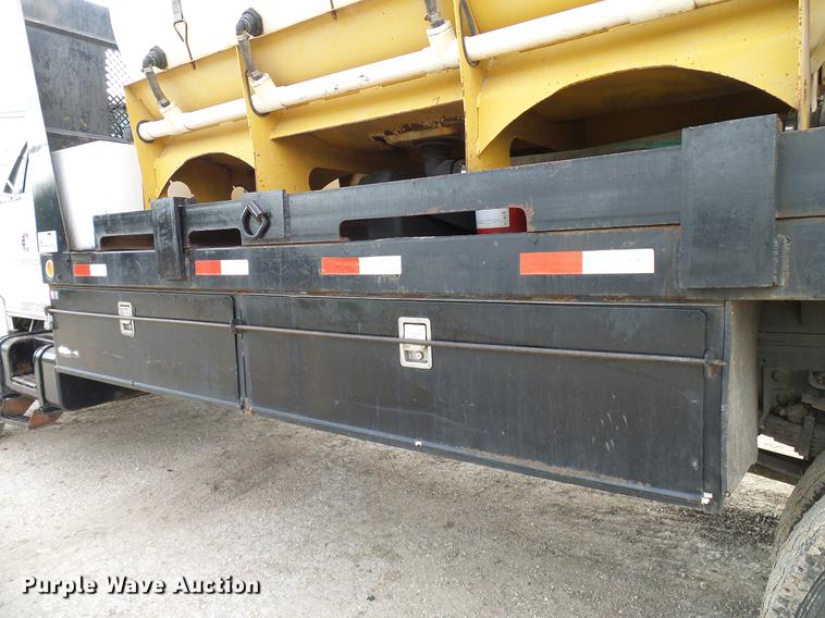 image for item DD8312 1998 Ford F800 flatbed truck with Vermeer MTE37 mud mix system