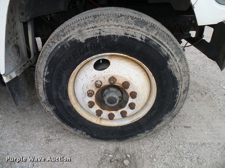 image for item DD8312 1998 Ford F800 flatbed truck with Vermeer MTE37 mud mix system