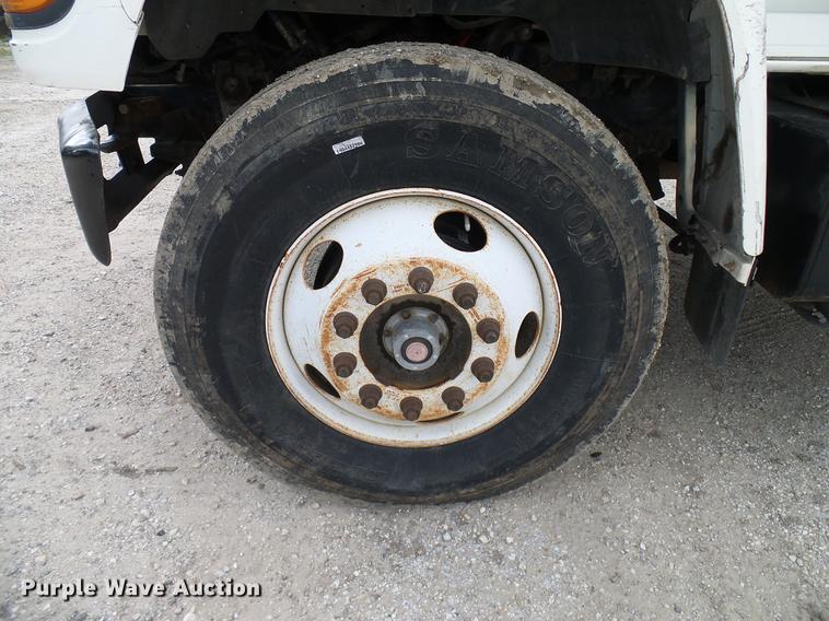 image for item DD8312 1998 Ford F800 flatbed truck with Vermeer MTE37 mud mix system