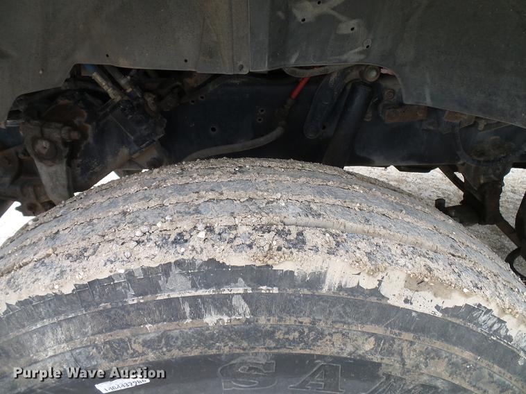 image for item DD8312 1998 Ford F800 flatbed truck with Vermeer MTE37 mud mix system