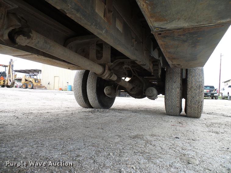 image for item DD8312 1998 Ford F800 flatbed truck with Vermeer MTE37 mud mix system