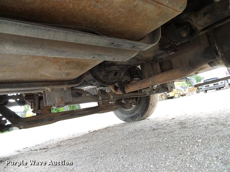 image for item DD8312 1998 Ford F800 flatbed truck with Vermeer MTE37 mud mix system