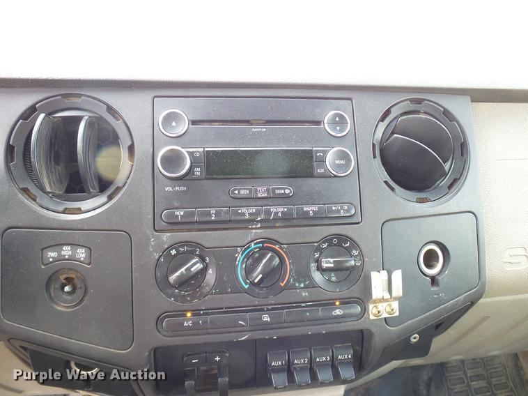 image for item DD8324 2010 Ford F450 Super Duty XL Crew Cab flatbed truck