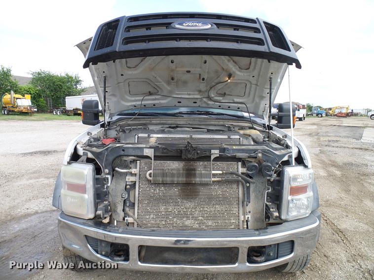 image for item DD8324 2010 Ford F450 Super Duty XL Crew Cab flatbed truck