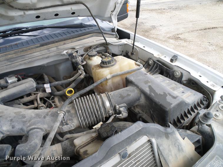 image for item DD8324 2010 Ford F450 Super Duty XL Crew Cab flatbed truck