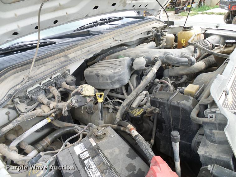 image for item DD8324 2010 Ford F450 Super Duty XL Crew Cab flatbed truck