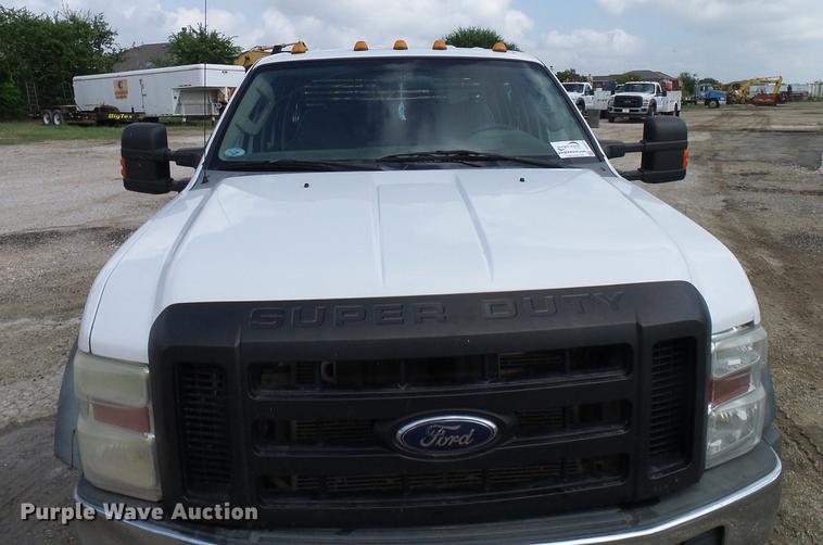 image for item DD8324 2010 Ford F450 Super Duty XL Crew Cab flatbed truck