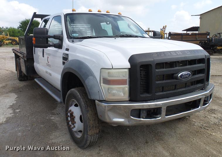 image for item DD8324 2010 Ford F450 Super Duty XL Crew Cab flatbed truck
