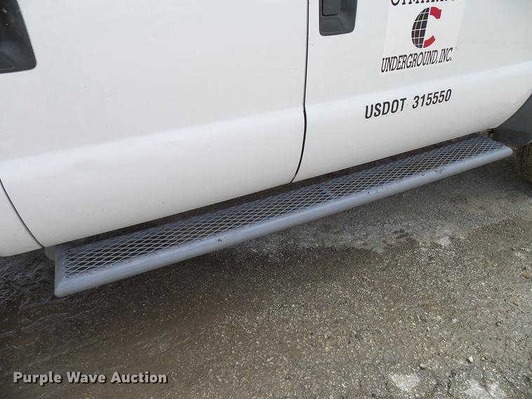 image for item DD8324 2010 Ford F450 Super Duty XL Crew Cab flatbed truck