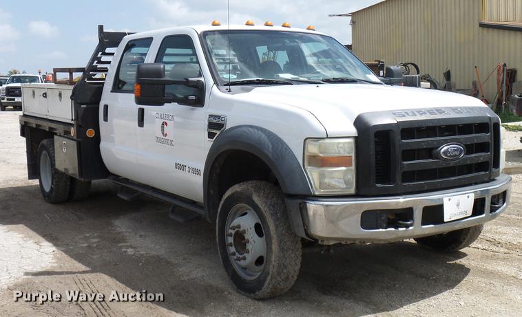 image for item DD8327 2008 Ford F450 Super Duty Crew Cab flatbed truck