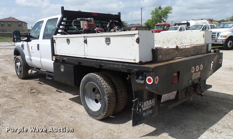 image for item DD8327 2008 Ford F450 Super Duty Crew Cab flatbed truck