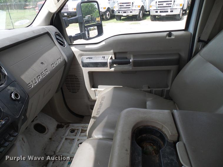 image for item DD8327 2008 Ford F450 Super Duty Crew Cab flatbed truck