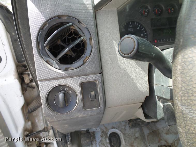 image for item DD8327 2008 Ford F450 Super Duty Crew Cab flatbed truck