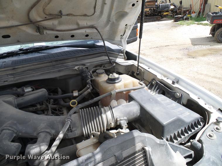 image for item DD8327 2008 Ford F450 Super Duty Crew Cab flatbed truck