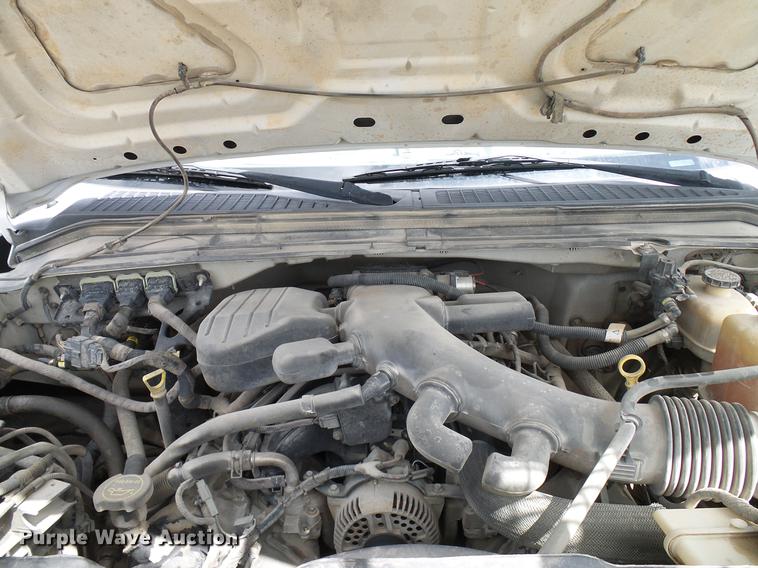 image for item DD8327 2008 Ford F450 Super Duty Crew Cab flatbed truck