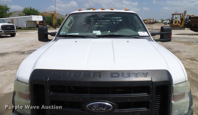 image for item DD8327 2008 Ford F450 Super Duty Crew Cab flatbed truck
