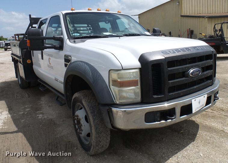 image for item DD8327 2008 Ford F450 Super Duty Crew Cab flatbed truck