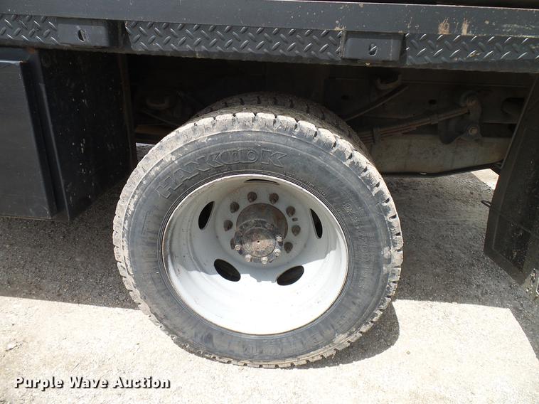 image for item DD8327 2008 Ford F450 Super Duty Crew Cab flatbed truck