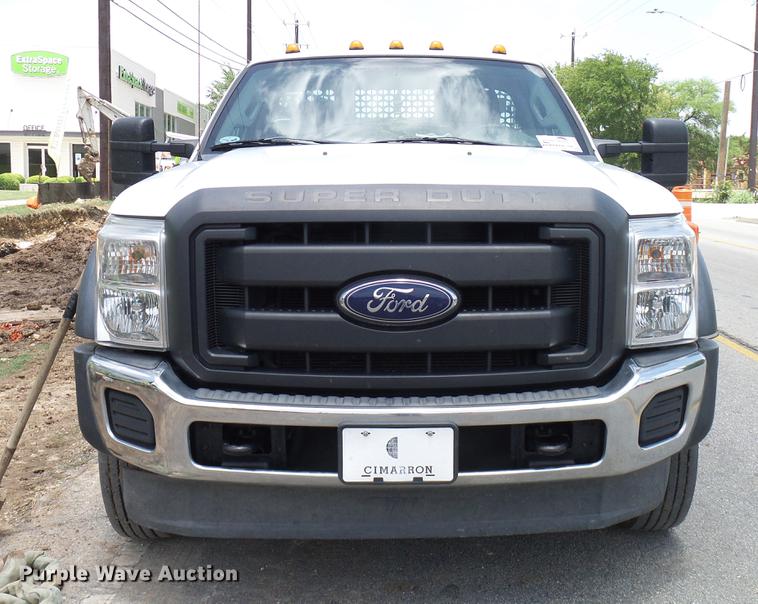 image for item DD8330 2014 Ford F550 Super Duty flat bed truck