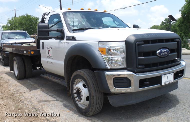 image for item DD8330 2014 Ford F550 Super Duty flat bed truck