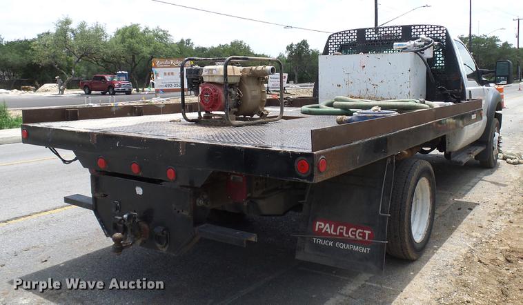 image for item DD8330 2014 Ford F550 Super Duty flat bed truck