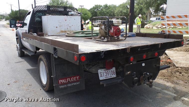 image for item DD8330 2014 Ford F550 Super Duty flat bed truck