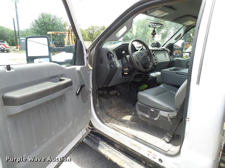 image for item DD8330 2014 Ford F550 Super Duty flat bed truck