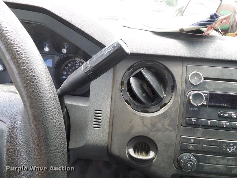 image for item DD8330 2014 Ford F550 Super Duty flat bed truck