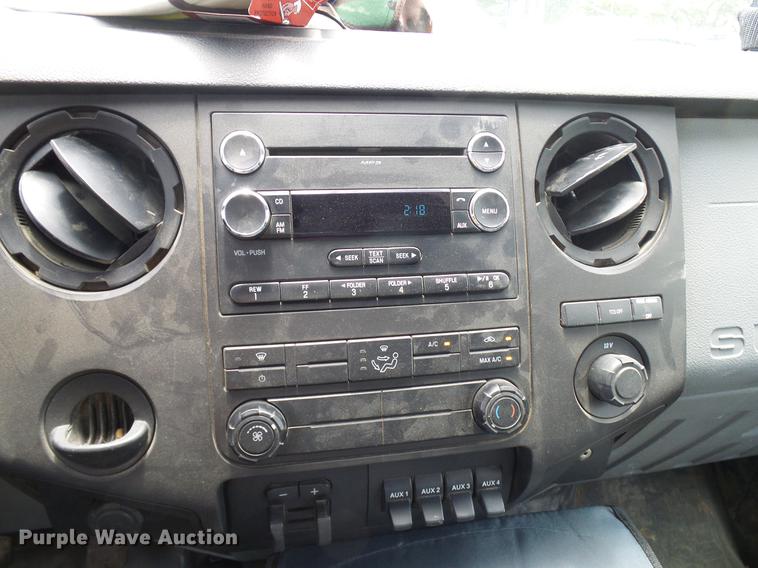 image for item DD8330 2014 Ford F550 Super Duty flat bed truck