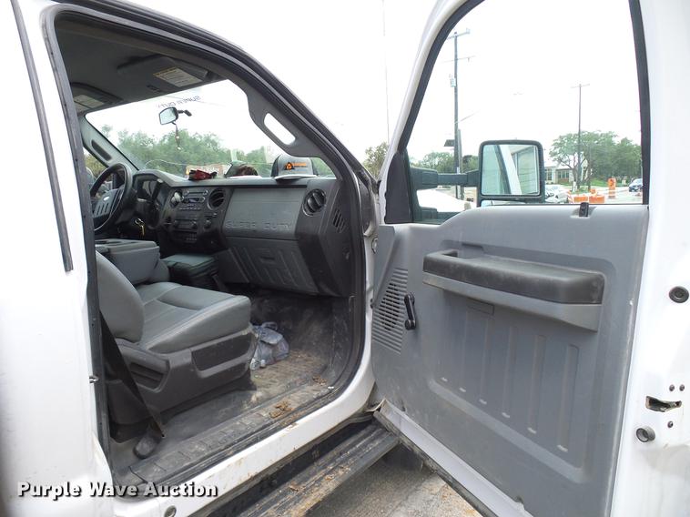 image for item DD8330 2014 Ford F550 Super Duty flat bed truck