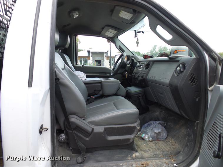 image for item DD8330 2014 Ford F550 Super Duty flat bed truck
