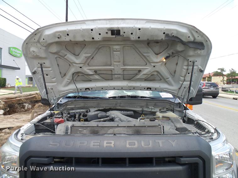 image for item DD8330 2014 Ford F550 Super Duty flat bed truck