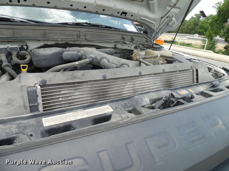 image for item DD8330 2014 Ford F550 Super Duty flat bed truck