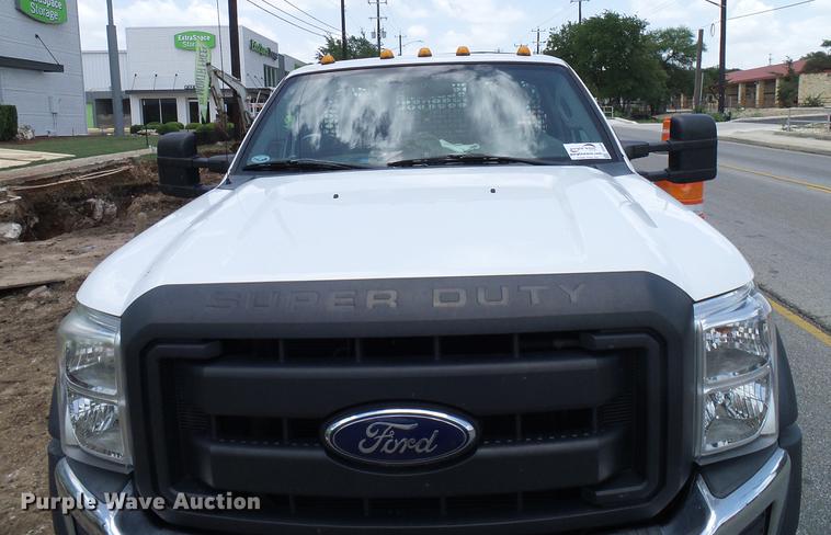 image for item DD8330 2014 Ford F550 Super Duty flat bed truck