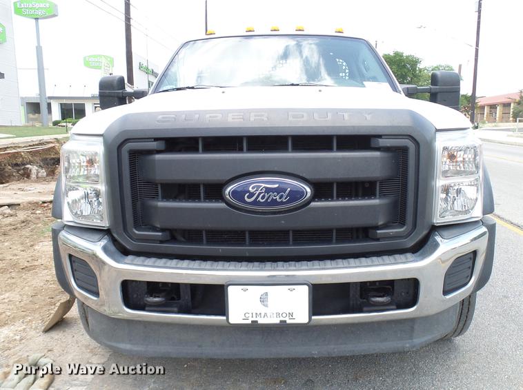 image for item DD8330 2014 Ford F550 Super Duty flat bed truck