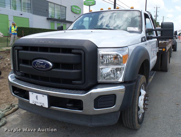 image for item DD8330 2014 Ford F550 Super Duty flat bed truck
