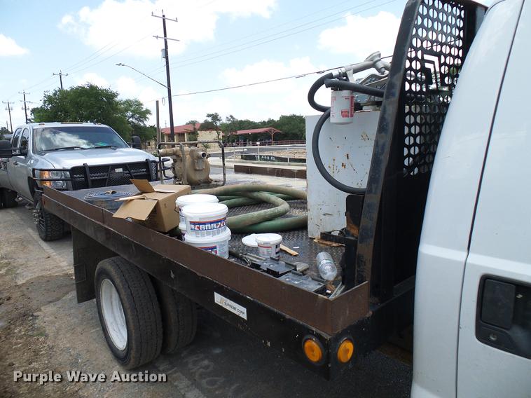 image for item DD8330 2014 Ford F550 Super Duty flat bed truck