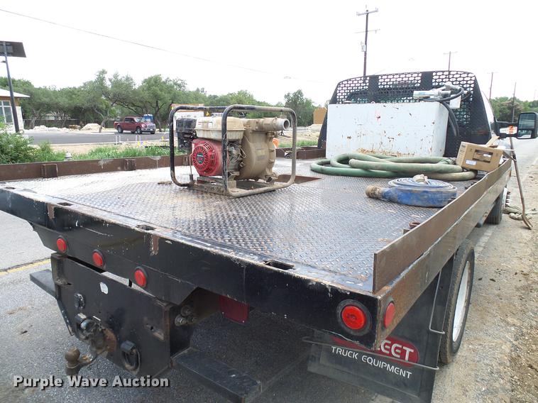 image for item DD8330 2014 Ford F550 Super Duty flat bed truck