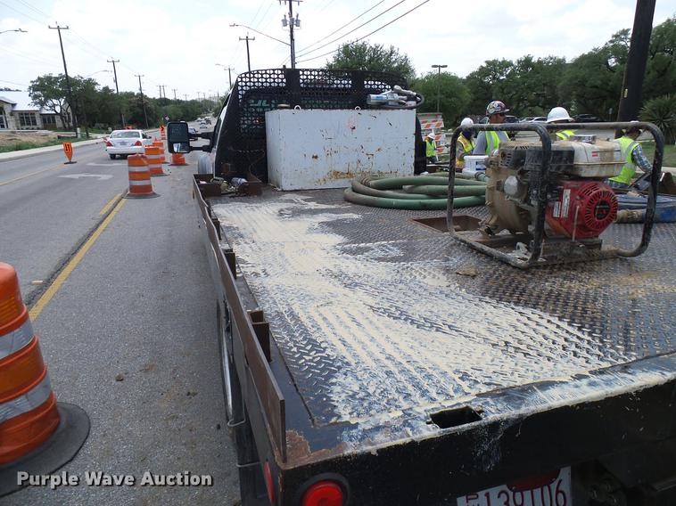 image for item DD8330 2014 Ford F550 Super Duty flat bed truck