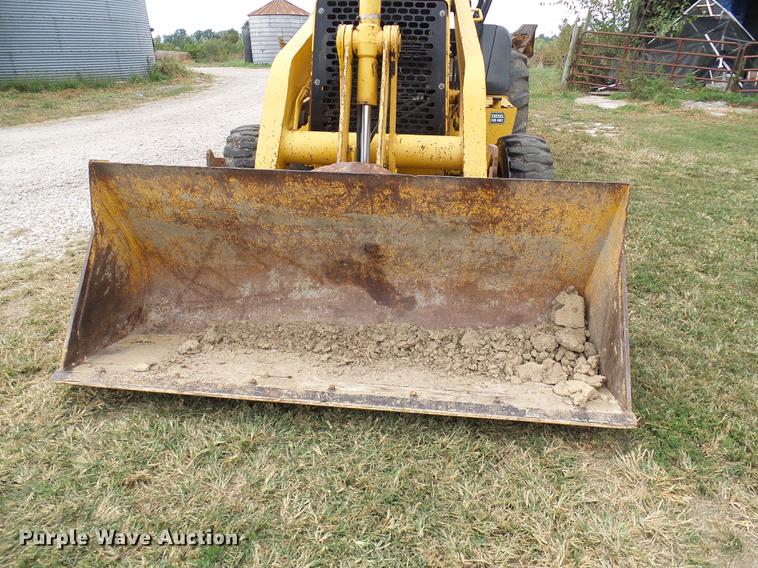 image for item DE5267 1999 John Deere 310E backhoe