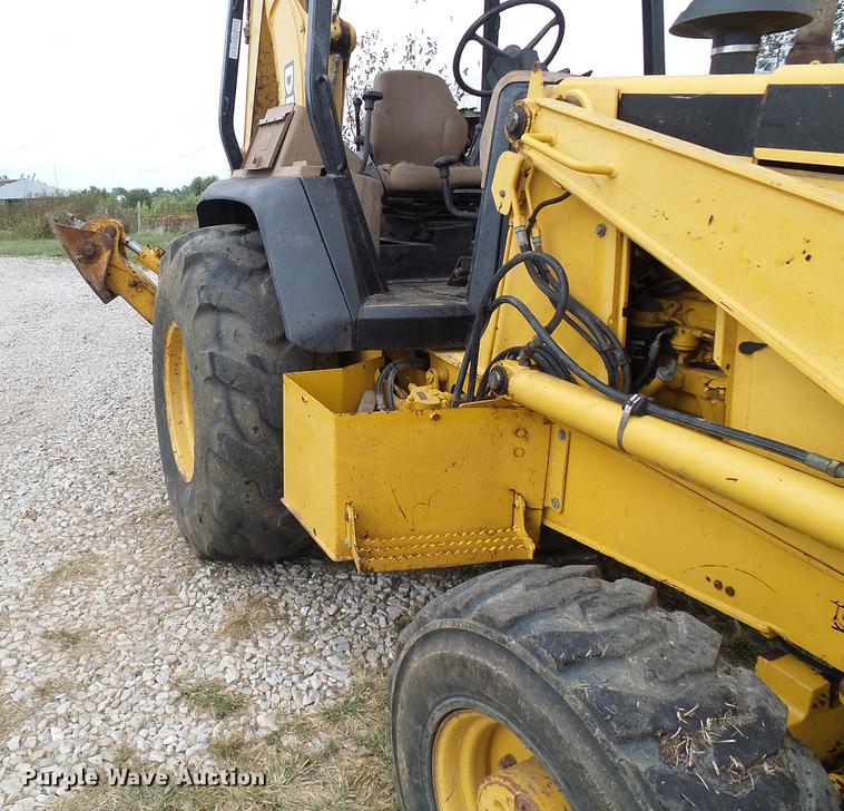 image for item DE5267 1999 John Deere 310E backhoe