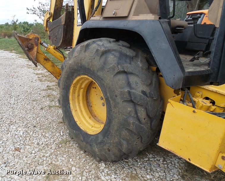 image for item DE5267 1999 John Deere 310E backhoe